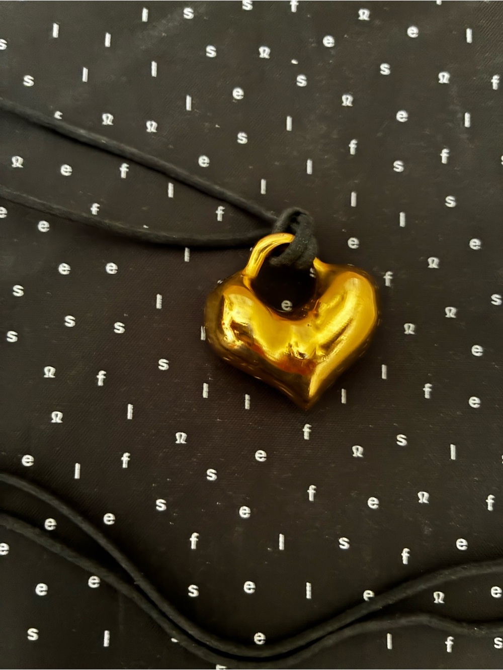 Robert Lee Morris Puffed Heart Pendant with black cord necklace